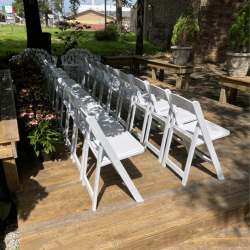 white padded chair event setup White Resin Chair